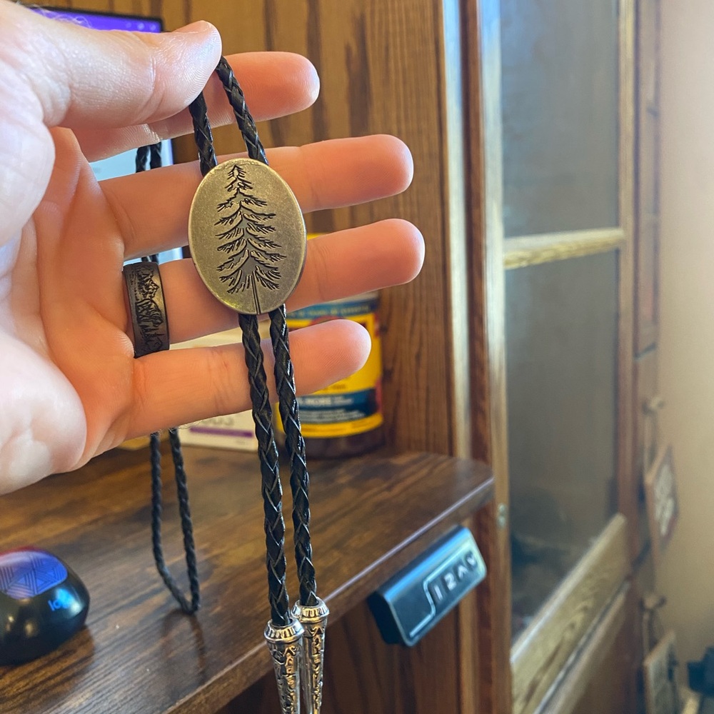 Black Braided Bolo Tie with Tree Emblem